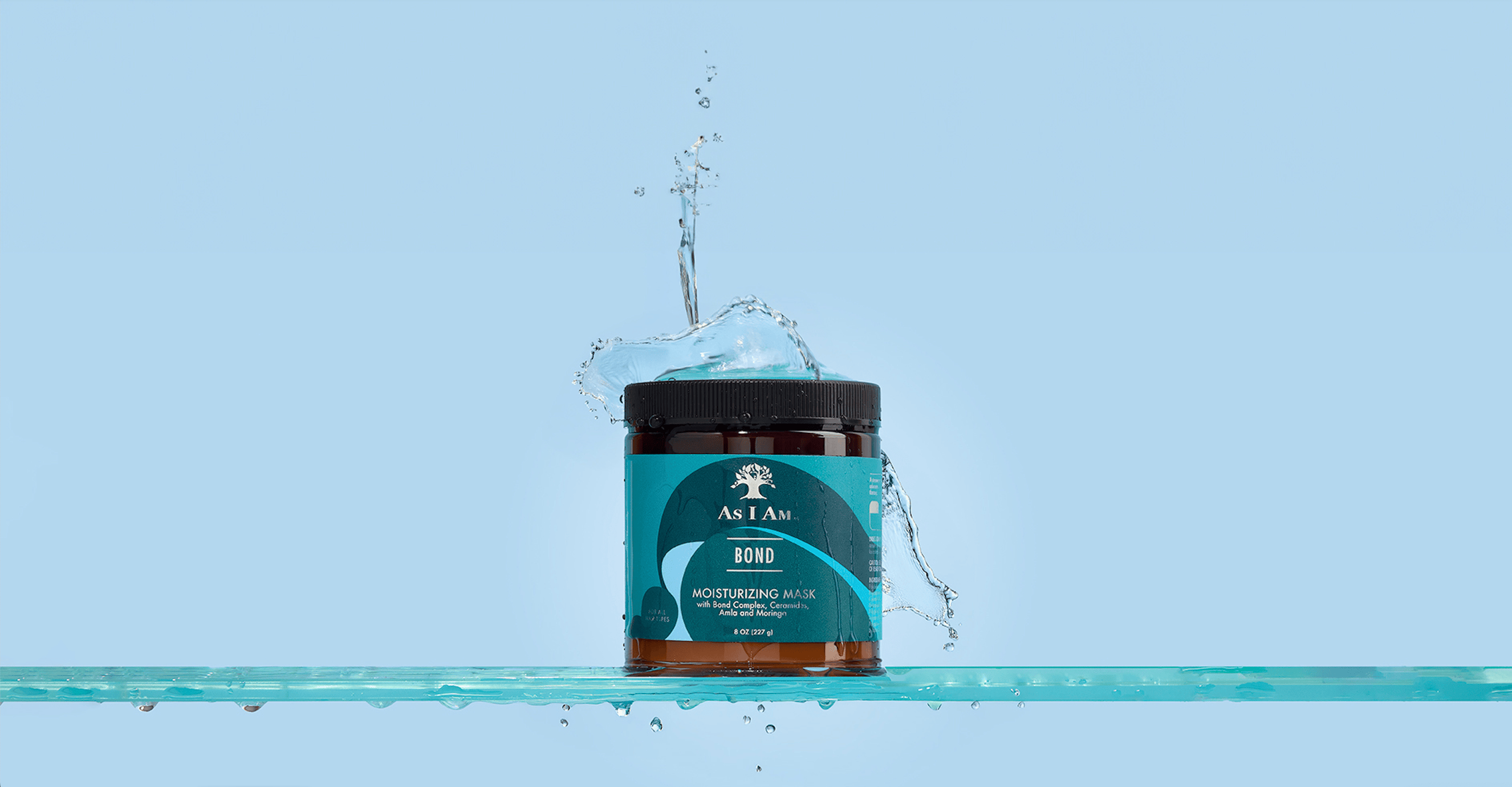 As I Am Bond Mask - un tratamiento capilar rico y cremoso en un elegante tarro beige, diseñado para reparar en profundidad y fortalecer los rizos y espirales dañados.