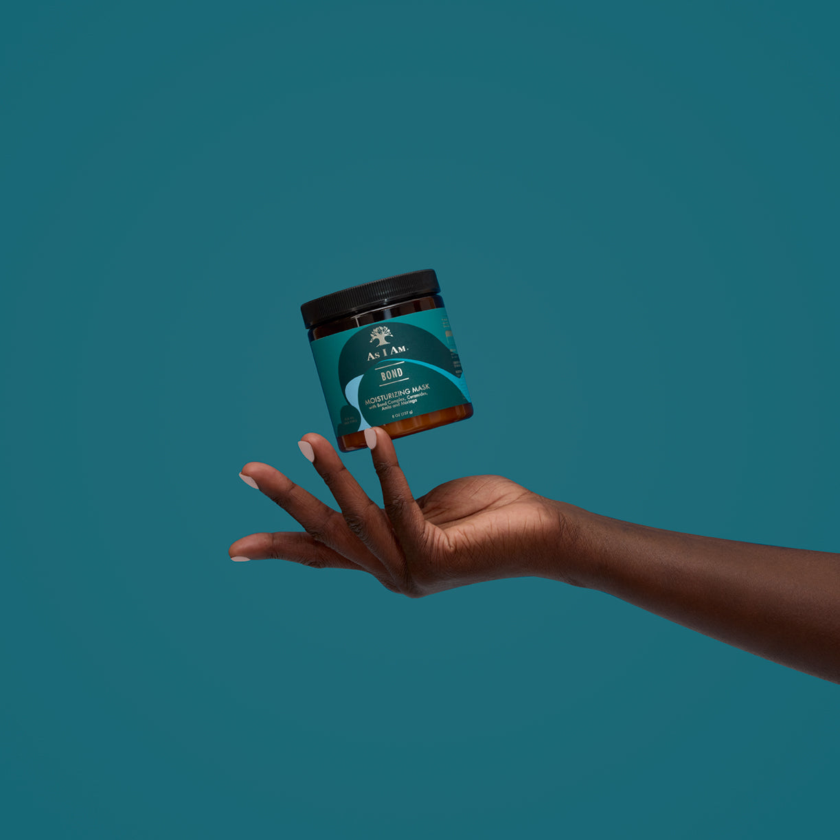Bond Mask de As I Am - Un tratamiento de acondicionamiento profundo que repara y fortalece el cabello desde el interior. Enriquecida con ingredientes hidratantes, esta mascarilla ayuda a restaurar el cabello dañado, mejorando su elasticidad y dejándolo suave, hidratado y revitalizado.