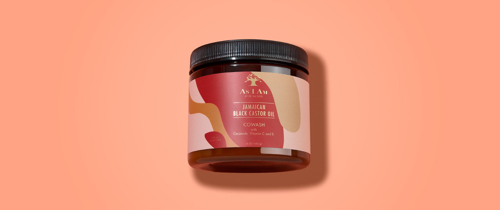 As I Am Jamaican Black Castor Oil CoWash - toma panorámica del acondicionador limpiador diseñado para eliminar suavemente la acumulación mientras hidrata y fortalece los rizos con JBCO.
