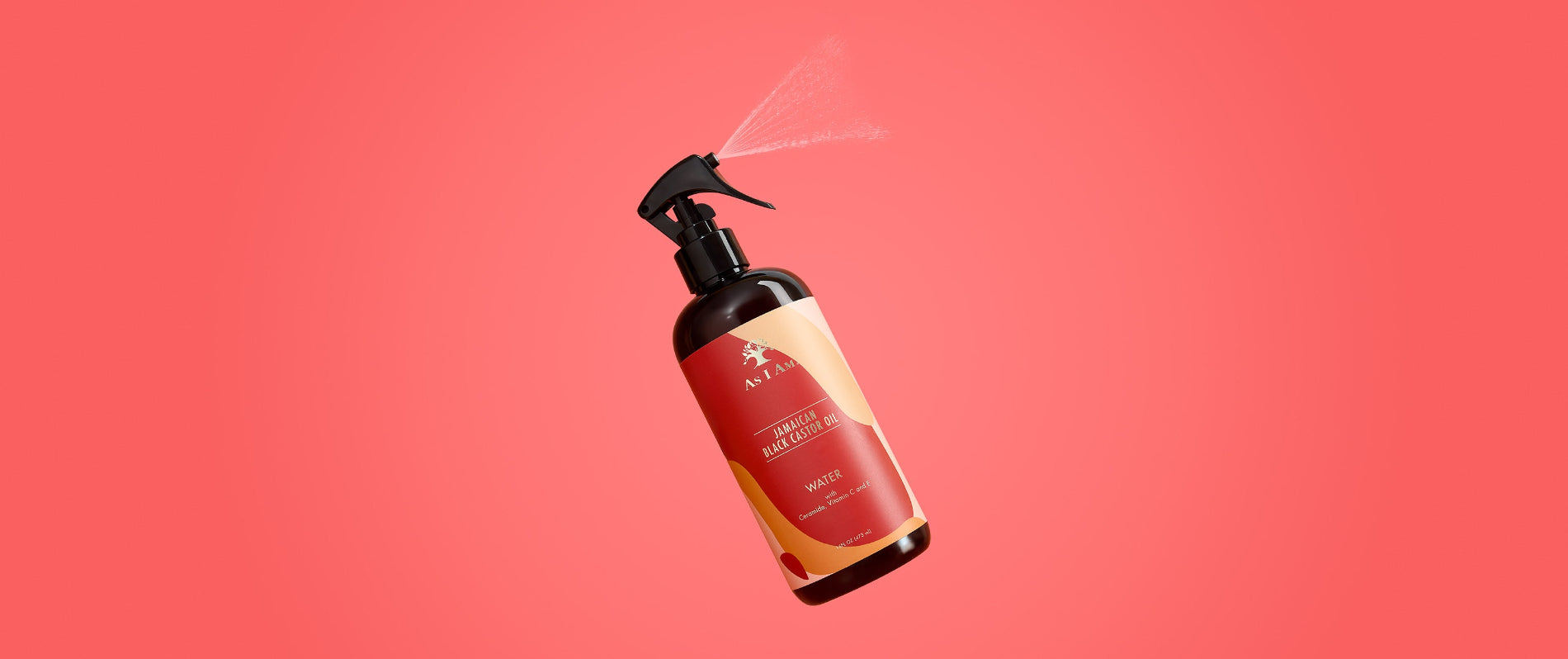 As I Am Jamaican Black Castor Oil Water - toma panorámica del ligero spray sin aclarado con JBCO, formulado para hidratar, desenredar y revitalizar los rizos naturales.
