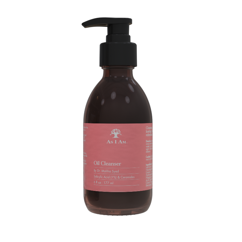 Botella de «limpiador a base de aceite» con dosificador sobre fondo blanco.