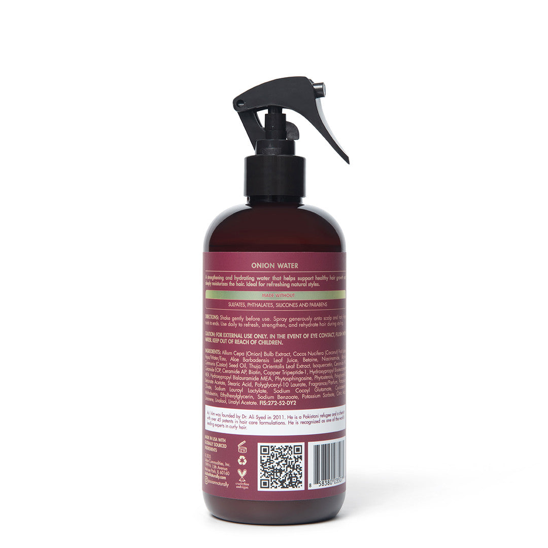 Botella con pulverizador sobre fondo blanco