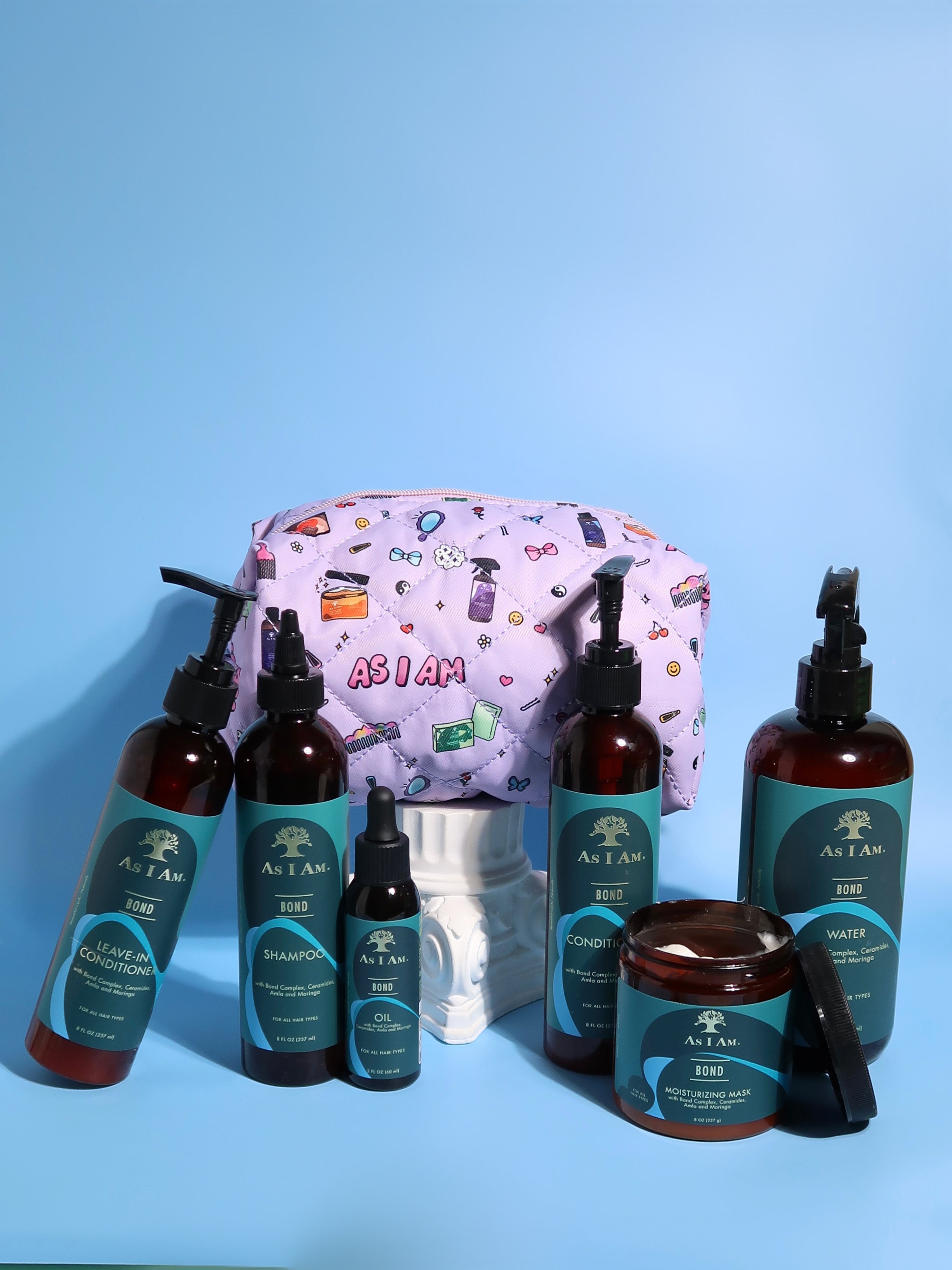 Neceser de la marca As I Am: elegante neceser de viaje con cremallera para guardar productos de belleza y cuidado del cabello.