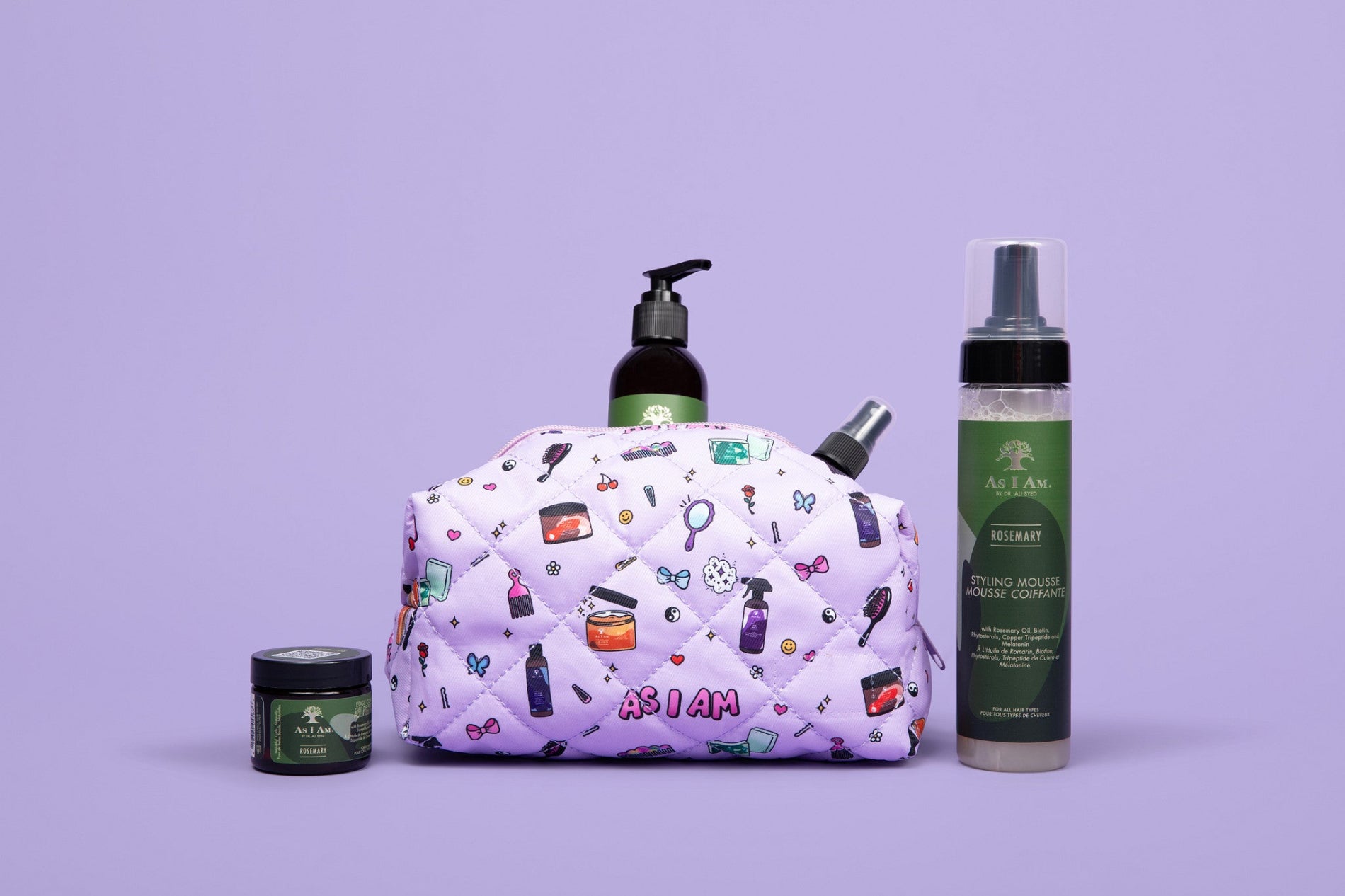Neceser As I Am con la colección de romero - imagen apaisada que muestra un suave neceser con cremallera diseñado para guardar los productos esenciales para el cuidado del cabello con un aspecto elegante y minimalista.

