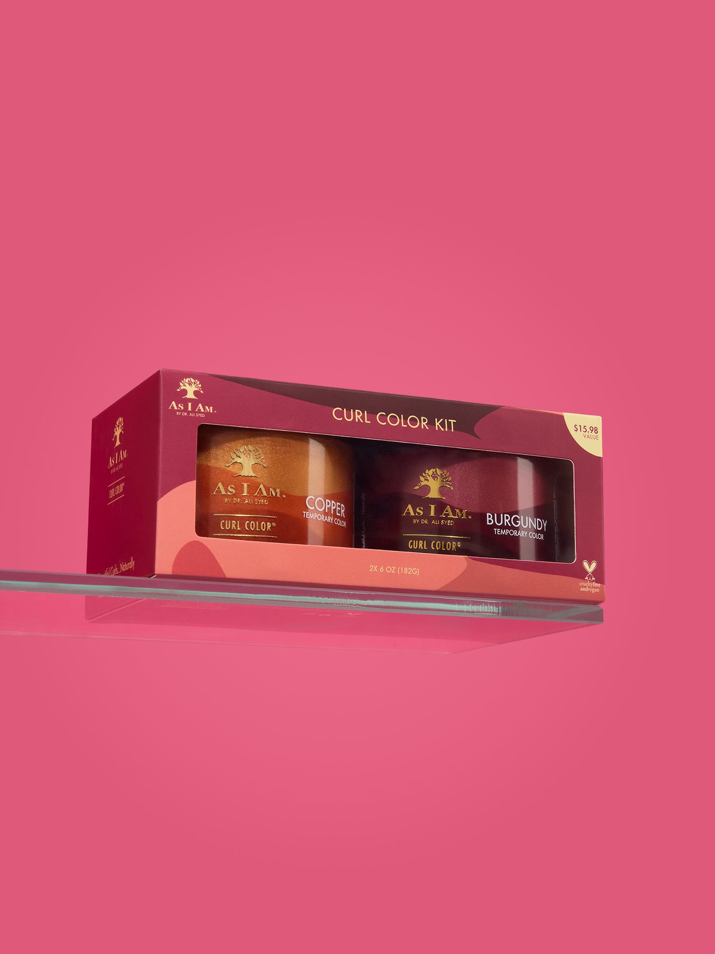El kit de 2 paquetes As I Am Curl Color incluye tonos cobre y burdeos, presentados en frascos elegantes y vibrantes, diseñados para brindar color temporal y definición de rizos sin dañarlos.