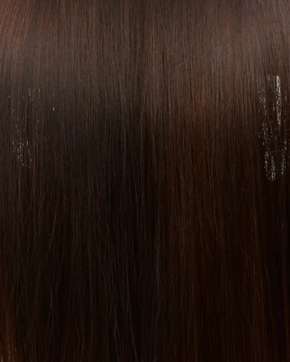 Primer plano de la textura del cabello castaño oscuro.