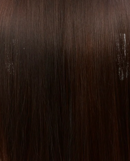 Primer plano de la textura del cabello castaño oscuro.